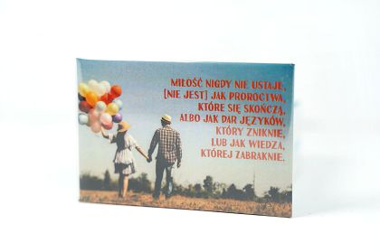 Magnes metalowy 8 x 5,5 cm - Miłość nigdy nie ustaje...